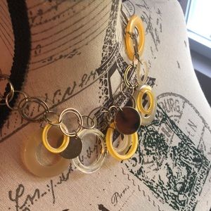 Dangling tortoise shell, yellow and gold link necklace